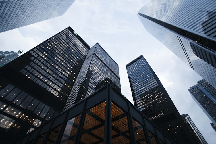 Glass towers under a clear sky